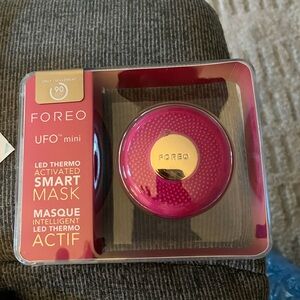 FOREO UFO Mini in Pink with Gold Details